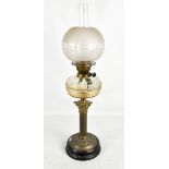 A 19th century brass Corinthian column oil lamp with clear and opaque etched glass shade, clear