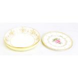 ROBERTS FOR ROYAL WORCESTER; a hand painted cabinet plate with central floral detail surrounded by a