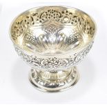 ALEXANDER CLARK MANUFACTURING CO; an Edward VII hallmarked silver pedestal rose bowl, repousse