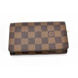 LOUIS VUITTON; a cloth Damier canvas wallet/purse, 14 x 10 x 3cm, with dust bag.