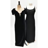 JOHN CHARLES; a full length black velvet vintage evening dress with side slit, and faux pearl