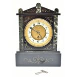 SAVAGE OF PARIS; a late 19th century French black slate and marble mantel clock of architectural