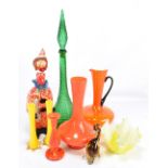 A group of art glass including yellow and clear glass cased pair of vases, orange ewer and vase,