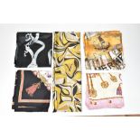 A pink and cream Les Cles silk scarf, 85 x 85cm, a navy blue, pink, cream and gold silk scarf with