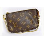 LOUIS VUITTON; a Monogram canvas brown leather evening bag, with gold-tone chain link strap, with