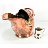 A Victorian copper coal scuttle and a silver plated mug (2).