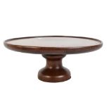 A Lazy Susan with mahogany top on later base, diameter 34.8cm.