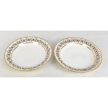A pair of 19th century Paris porcelain plates, diameter 24.4cm.Additional InformationBoth ring true,