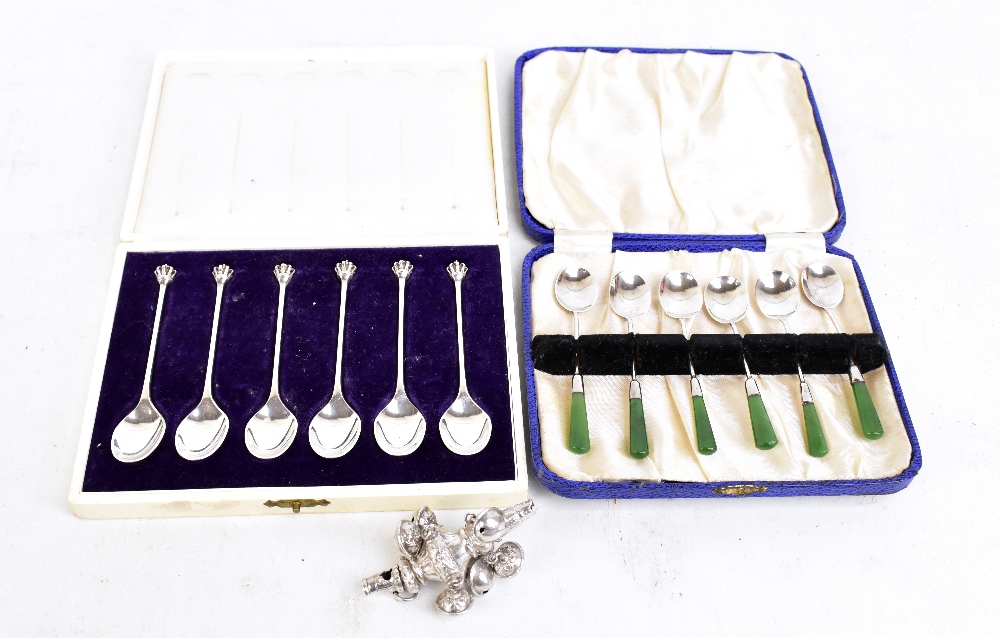 JW TIPTAFT & SON LTD; a cased set of six George V hallmarked silver coffee spoons with green