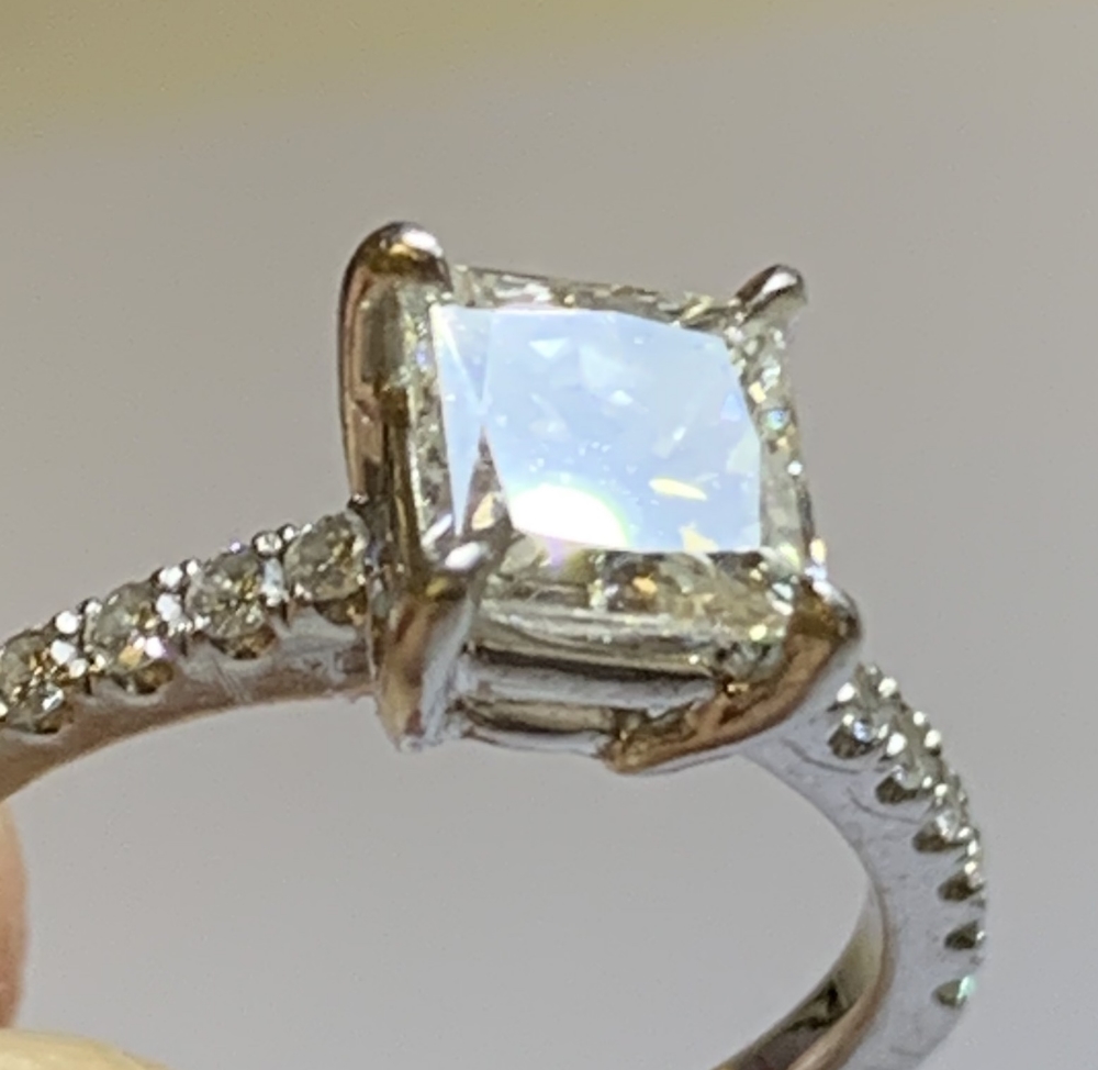 A platinum and diamond solitaire ring with central princess cut diamond weighing 1.52cts, with - Image 5 of 5