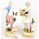 DRESDEN; a pair of late 19th century figures of a dandy and his companion, both with painted blue