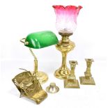 A small group of brass items to include a Victorian oil lamp with cranberry glass shade, an early