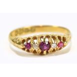 An 18ct yellow gold pink sapphire and diamond ring, hallmarked for Chester 1917, size N 1/2,