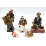 ROYAL DOULTON; three figures comprising HN1365 'Merchant', HN1464 'The Carpet Seller', and HN2818 '