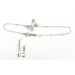 MESSIKA OF PARIS; an 18ct white gold diamond set butterfly bracelet, length 17cm.