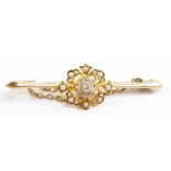 An Edwardian 15ct yellow gold openwork brooch set with diamonds and cultured freshwater seed pearls,