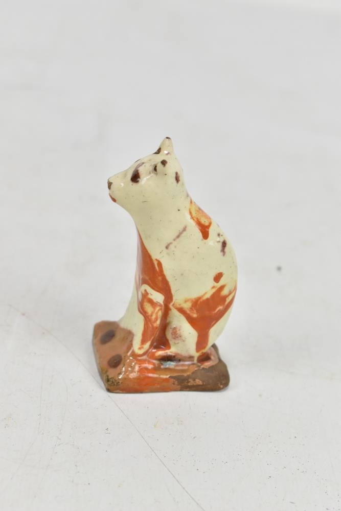 An early 19th century Bovey Tracey cream glazed model of a seated cat, height 8.7cm.Additional - Image 2 of 4