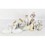 LLADRO; six figurines, to include a lying figure with ball, 'Endless Love', Pierrette, etc, in