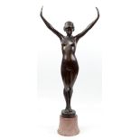 A contemporary bronzed metal Art Deco-style figure modelled as a nude lady, impressed signature '