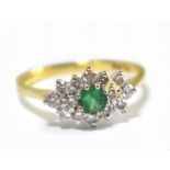 An 18ct yellow gold diamond and emerald and cluster ring, size L, approx 2.2g.