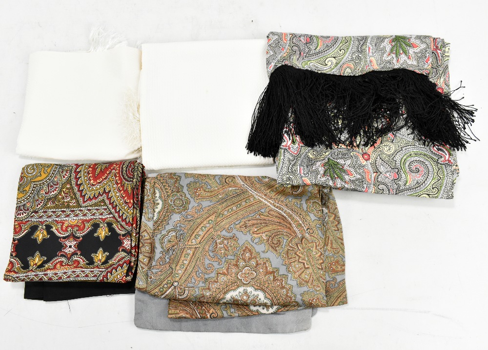 Three Paisley silk long scarves and two cream silk evening scarves (5). Footnote: belonged to