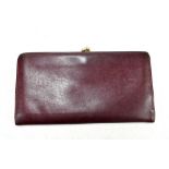 ASPREY OF LONDON; a vintage burgundy leather purse/card wallet, 18 x 9 x 2cm.