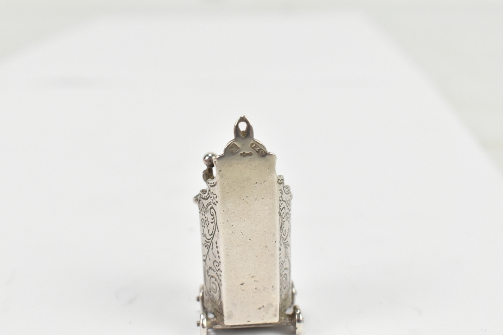 Two Dutch silver novelty miniatures comprising a seesaw and a gentleman upon a rostrum, possibly - Image 2 of 3