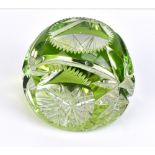 VAL ST LAMBERT; a cut and faceted overlay glass paperweight, diameter 8.5cm, with star cut base.
