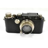 LEICA; a pre-war black body camera, no.132245, with Summar F=5cm 1:2 lens, no.208748, cased.