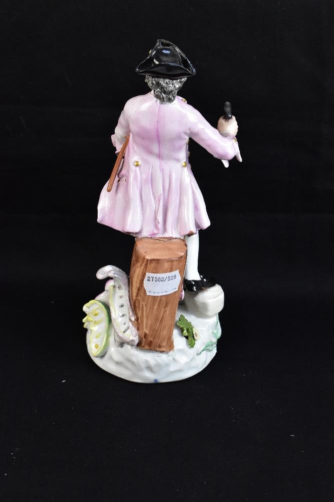 MEISSEN; a mid-18th century figure of a sword maker, painted marks to back of base, height 23cm. - Image 3 of 7