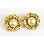 CHANEL; a pair of clip-on vintage Chanel faux pearl earrings with gold toned rope and diamante