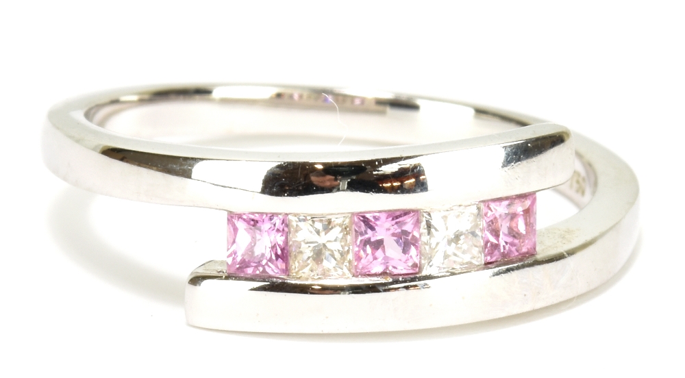 An 18ct white gold pink sapphire and diamond five stone ring, size N, approx 3.6g.