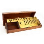 A Layton's improved arithmometer, London 1912, housed in original mahogany case (lid loose).