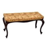 A French mahogany upholstered foot stool.