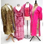 A gold lamé and purple long coat, a pink silk embroidered Indian coat, a Voyage pink rose cardigan