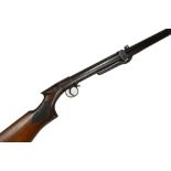 BSA; an under-lever tap loading .177 air rifle, number L58146, with branded walnut stock.