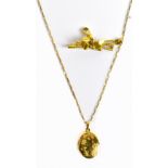 A 9ct yellow gold chain supporting an oval locket and a yellow metal broach, af, combined approx 8.