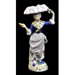 MEISSEN; a late 19th century figure of an oyster seller modelled on the 18th century original,