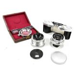 ZEISS; a Biogon 1:4,5 F=21mm lens, no.1855975, in bubble case, a T coated biometar 1:2,8 F=35mm