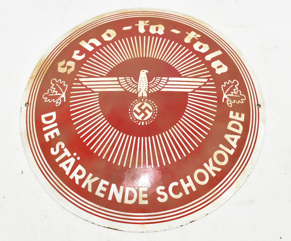 A Third Reich circular enamelled advertising sign for Scho-Ka Kola chocolate with motto 'Die