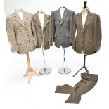 DUNN & CO; a 100% wool handwoven Harris Tweed brown and cream gentleman's jacket with leather
