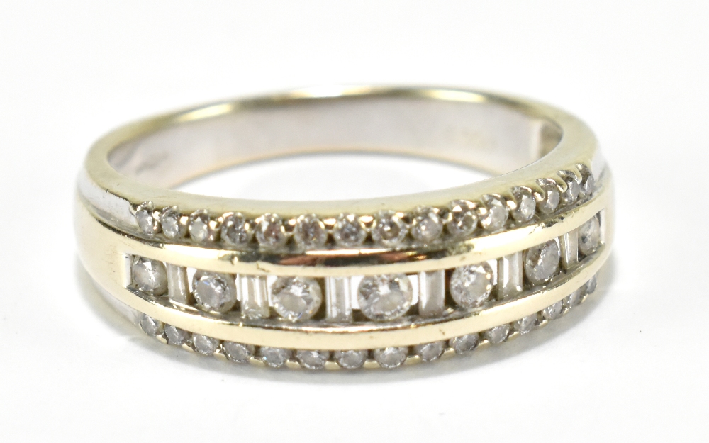 An 18ct white gold half eternity ring set with three rows of diamonds totalling 0.50cts, size P,