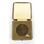 A National Emergency Medal dated May 1926, unnamed, cased.