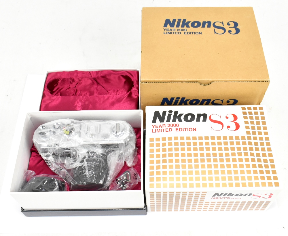 NIKON; a boxed limited edition S3 camera from 2000, with 1.4-50mm lens with hood, fitted case in box