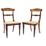 A set of six early 19th century rosewood bar back cane seated dining chairs with lobed tapering