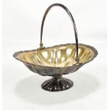 A Finnish silver swing handled bowl, with cast scroll handle, with gilt interior, impressed marks