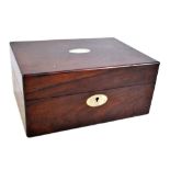 A Victorian rosewood sewing box with mother of pearl inlay, the hinged cover enclosing fitted