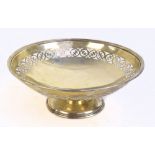 BARKER BROS LTD; a George V hallmarked silver bowl with pierced detail on spreading circular foot,