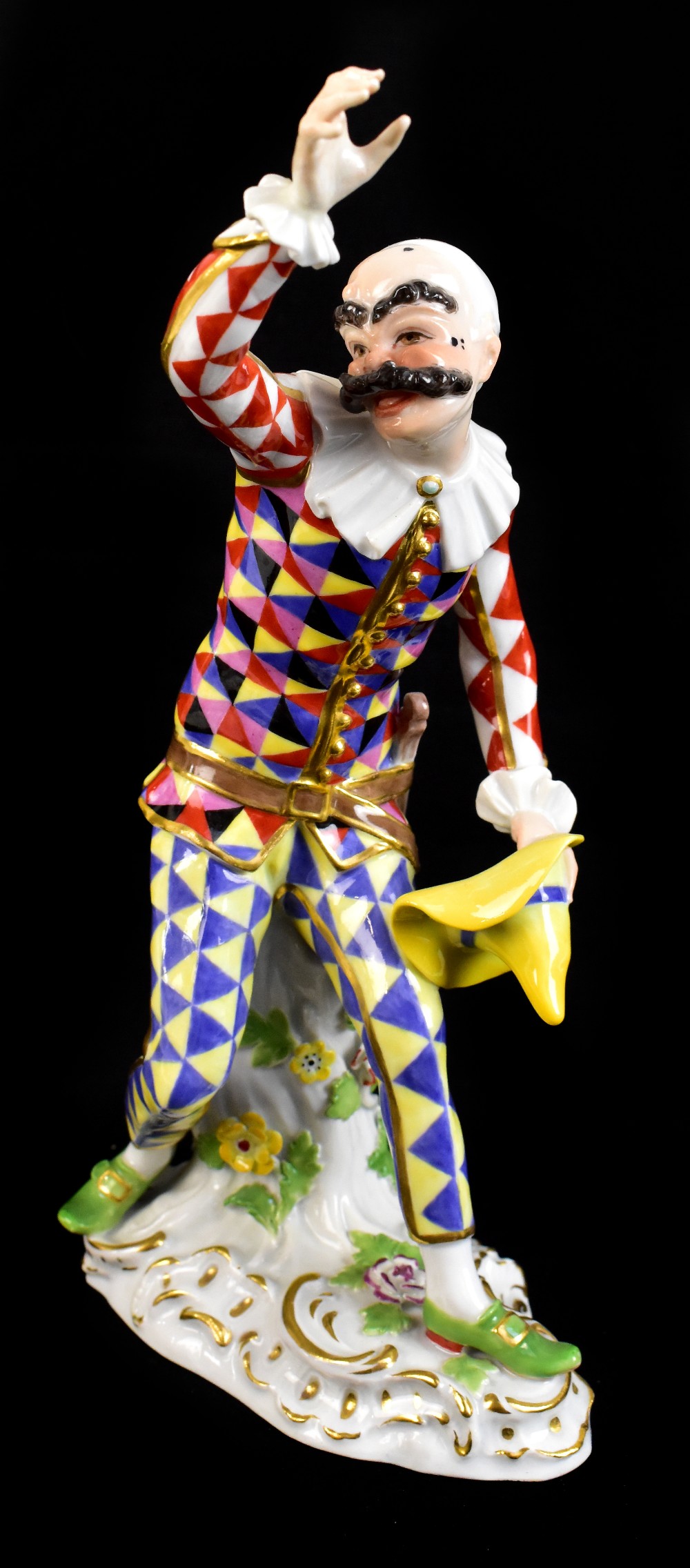 MEISSEN; a late 19th century figure of Harlequin modelled from the 18th century original, painted
