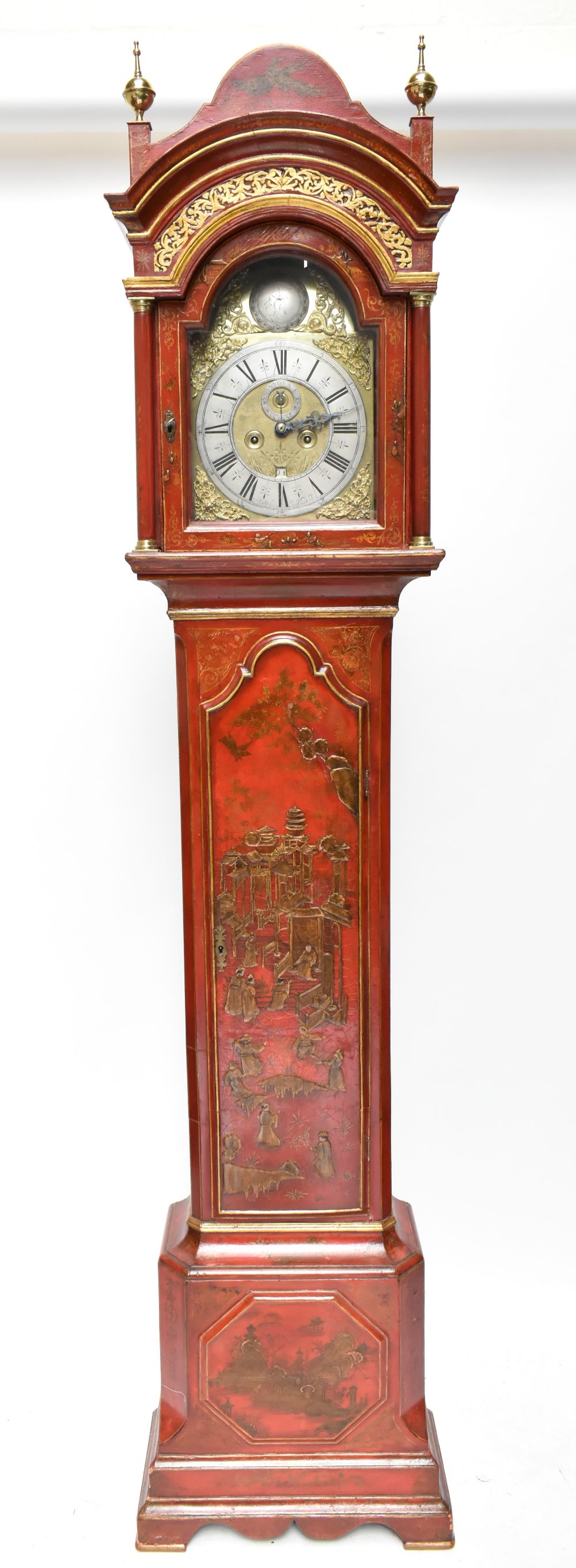 JOSEPH JACKMAN JNR OF LONDON BRIDGE; an English red japanned longcase clock, the brass dial signed